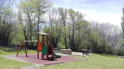 Zona de juegos infantil en Apartamentos Ball Benas Edificio Mirador