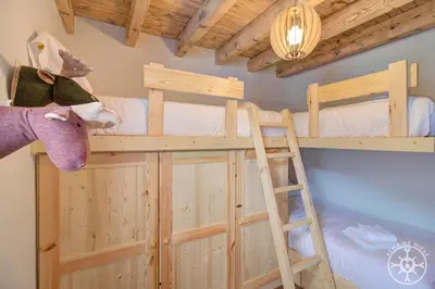 Cama o camas de una habitación en CASA ERA CUMA de Alma de Nieve