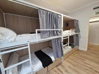 Cama o camas de una habitación en Aloha Hostel