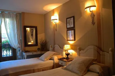Cama o camas de una habitación en Hotel Casa Frauca