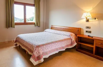 Cama o camas de una habitación en Hotel Venta La Pintada