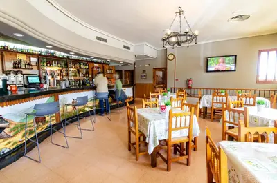 El salón o zona de bar de Hotel Venta La Pintada