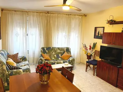 Una televisión o centro de entretenimiento en Casa De La Virginia