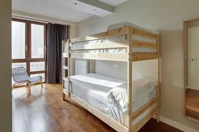 Cama o camas de una habitación en Pamplonapartments Duque de Ahumada