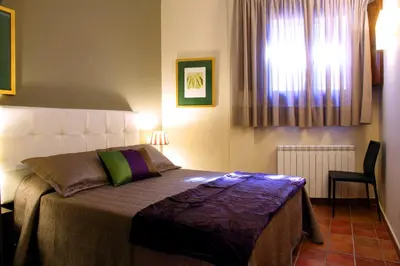 Cama o camas de una habitación en Apartamentos Casa Molinero