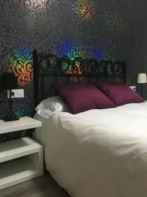 Cama o camas de una habitación en Apartamentos San Gregorio