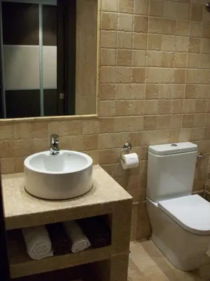Un baño de Apartamentos San Gregorio