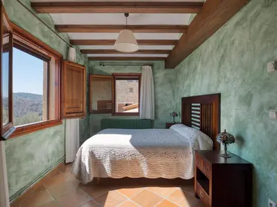 Cama o camas de una habitación en Casa del Moliner