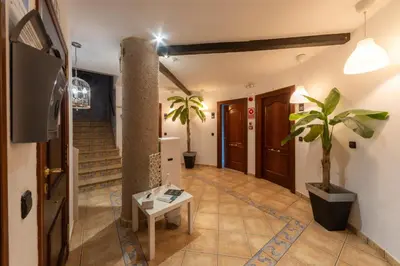 Una televisión o centro de entretenimiento en Apartamentos Los Angeles