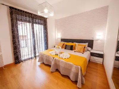 Cama o camas de una habitación en APARTAMENTOS ARGIA 2