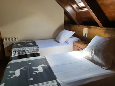 Cama o camas de una habitación en VIELHA XIV