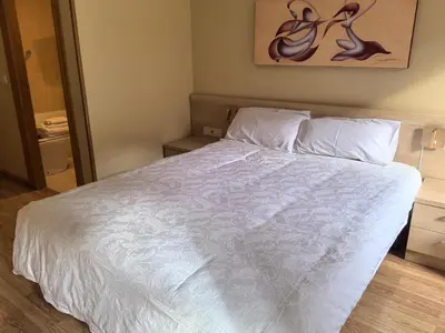 Cama o camas de una habitación en Hostal San Isidro