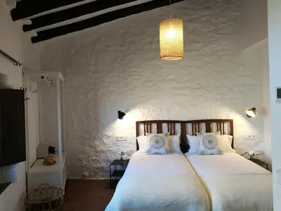 Cama o camas de una habitación en Hostal Blavet