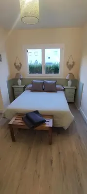 Cama o camas de una habitación en villa cocolo