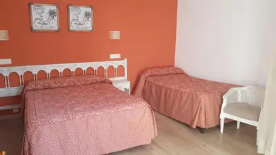 Cama o camas de una habitación en Pension Malida