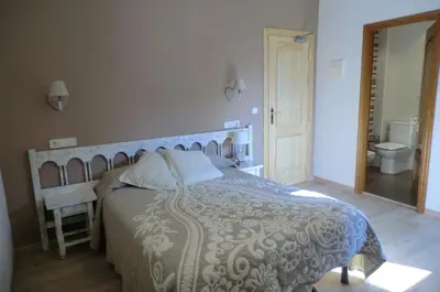 Cama o camas de una habitación en Pension Malida