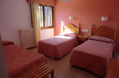 Cama o camas de una habitación en Pension Malida