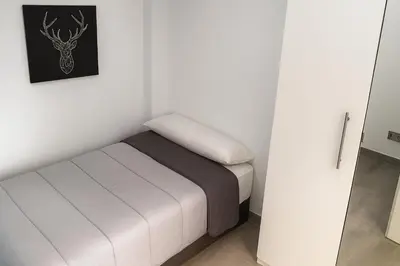 Cama o camas de una habitación en EXCLUSIVO TAPAS EL TUBO CHECKIN 24H Centro 1