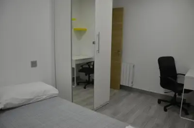Cama o camas de una habitación en CHECK-IN 24H NUEVO Único WIFI FAMILIAR Centro Planta 3