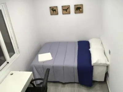 Cama o camas de una habitación en Check-in 24H PLAZA ESPAÑA AMPLIO Centro planta 4
