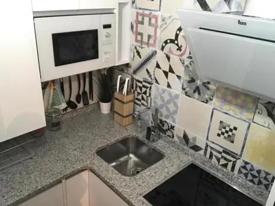 Una cocina o zona de cocina en ÁTICO ACOGEDOR LUJOSO CHECK-IN 24H PENTHOUSE 5 Planta 5