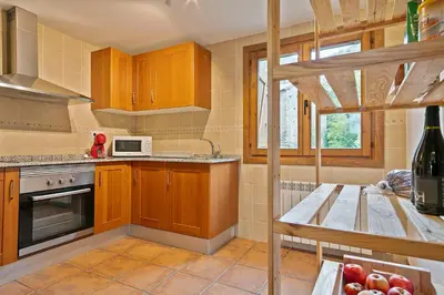 Una cocina o zona de cocina en Apartament Dúplex amb encant a l'alta muntanya - Saraís