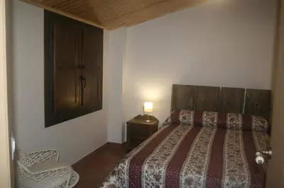 Cama o camas de una habitación en Apartamentos Plan Dulcis