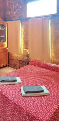 Una televisión o centro de entretenimiento en Spacious villa with private pool in La Puebla de Castro
