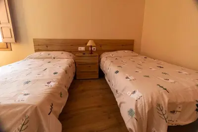 Cama o camas de una habitación en CAL METGE
