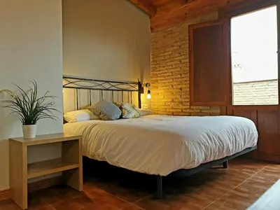 Cama o camas de una habitación en B&B La Atalaya