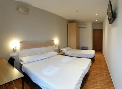 Cama o camas de una habitación en B&B La Atalaya