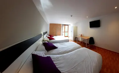 Cama o camas de una habitación en B&B La Atalaya