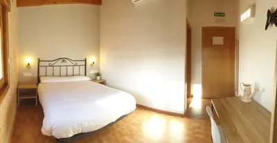 Cama o camas de una habitación en B&B La Atalaya