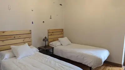 Cama o camas de una habitación en Apartamento Ábside de San Juan I