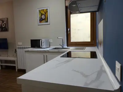 Una cocina o zona de cocina en Apartamento Ábside de San Juan II