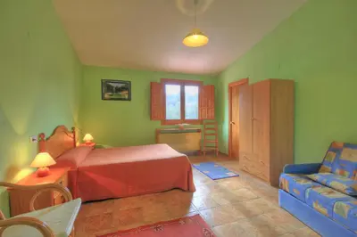 Cama o camas de una habitación en Albergue Barranc de la Serra