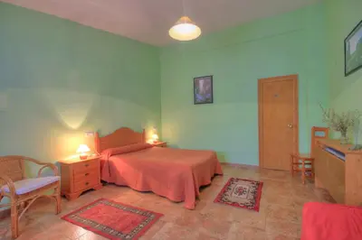 Cama o camas de una habitación en Albergue Barranc de la Serra