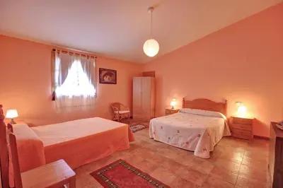 Cama o camas de una habitación en Albergue Barranc de la Serra