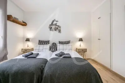 Cama o camas de una habitación en Bonaigua 708 by SeaMount Rentals