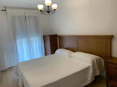 Cama o camas de una habitación en Apartamento dúplex en el centro de Huesca