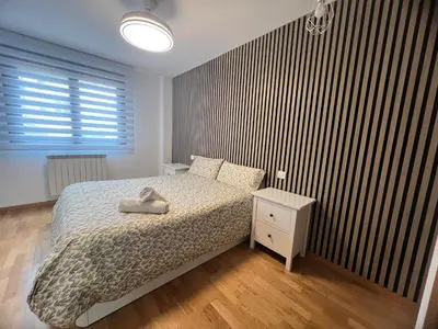 Cama o camas de una habitación en El Llano I, parada en el destino