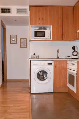 Una cocina o zona de cocina en El Llano I, parada en el destino