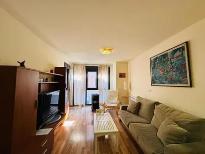 Una televisión o centro de entretenimiento en Bonito Apartamento en Ainsa