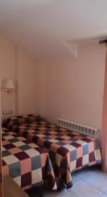 Cama o camas de una habitación en Apartamentos Solans