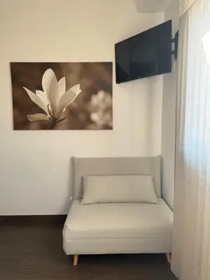 Una televisión o centro de entretenimiento en Casa Rural Maria Isabel