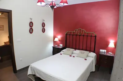 Cama o camas de una habitación en Casa Rural Maria Isabel