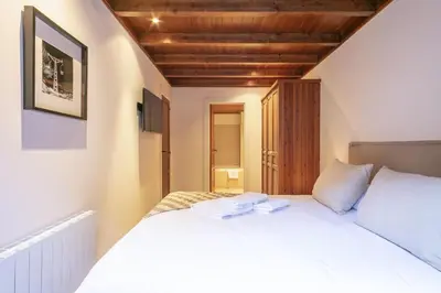 Cama o camas de una habitación en Luderna - Apartamento Val de Ruda A5 Orla