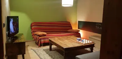 Una televisión o centro de entretenimiento en Casa Ton del Mingo
