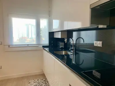 Una cocina o zona de cocina en BPIRINEOS-Benazken