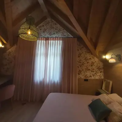 Cama o camas de una habitación en Casa Sallent con bañera hidromasaje y jardín